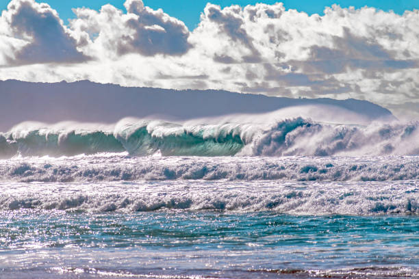 Oahu, Hawaii - December 23, 2022\nMassive ocean waves at Pipeline Beach on the north shore of Oahu, Hawaii.