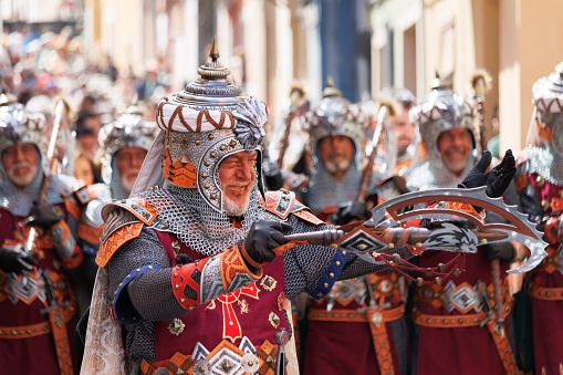 Alcoy, Spain, 04-20-2024: Special squad of the Mozarabes troupe for its hundredth anniversary in the Moors and Christians parade of Alcoy, a festival of international tourist interest since 1980