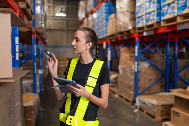 istock Women staff worker Standing counting and inspecting products. 2149614880