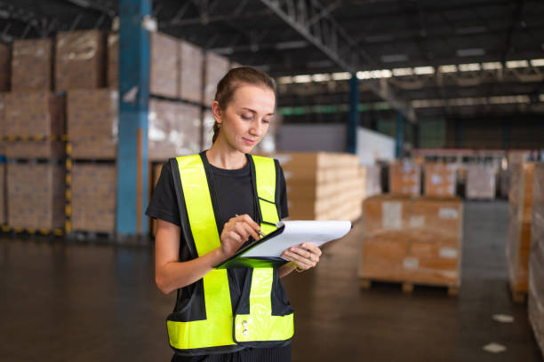 istock Portrait women staff worker Standing counting and inspecting products. 2149615549