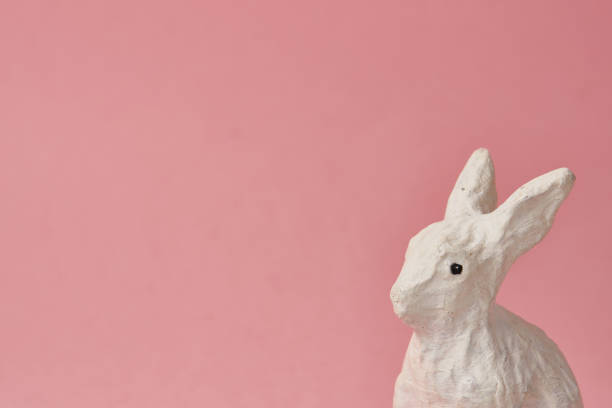 istock Easter bunny on a pink background toy animal holidays 2149616165