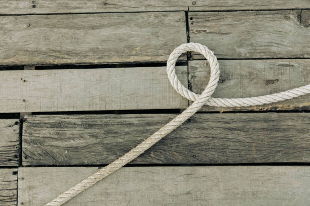 istock Rope on a wooden background 2149617914