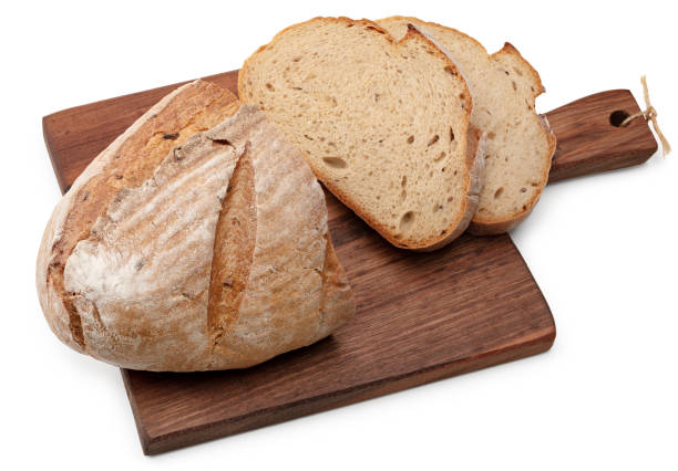 istock sliced freshly baked bread on dark wooden background. clipping path 2149619015