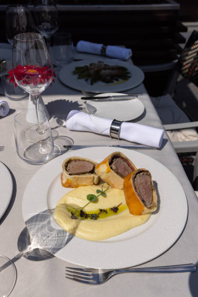 istock Beef Wellington,  whole beef tenderloin fillet, served on plate with mashed potato 2149620887