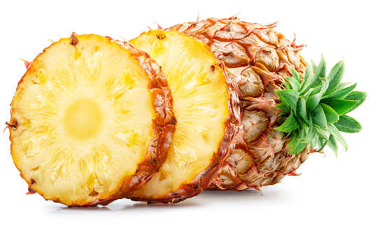 Ripe pineapple and pineapple cross slices isolated on white background. File contains clipping path.