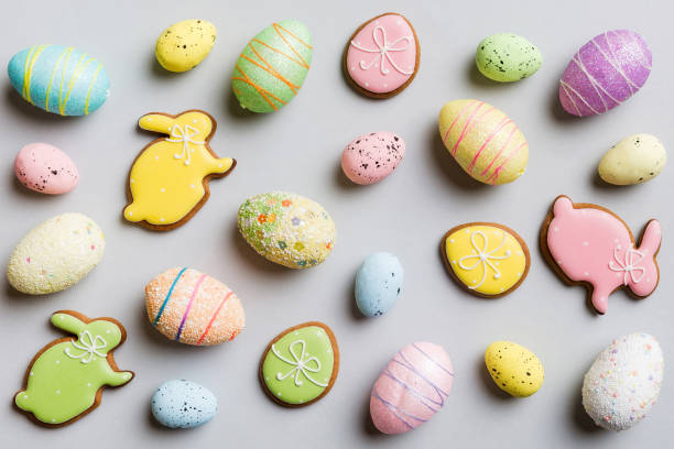 istock Happy Easter concept. Preparation for holiday. Easter eggs on colored background. flat lay top view copy space banner 2149622369