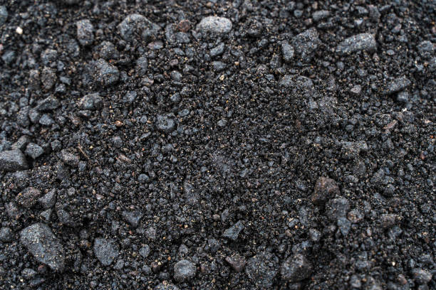 istock Black soil texture background. Black land surface. Farm agriculture field. 2149623448