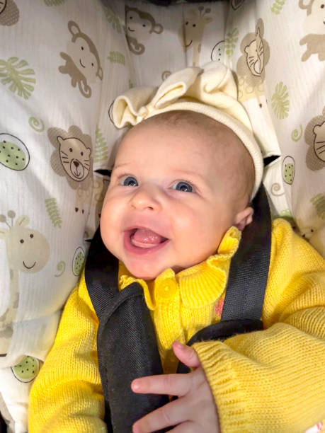 istock Two month baby awake and smiling 2149624338