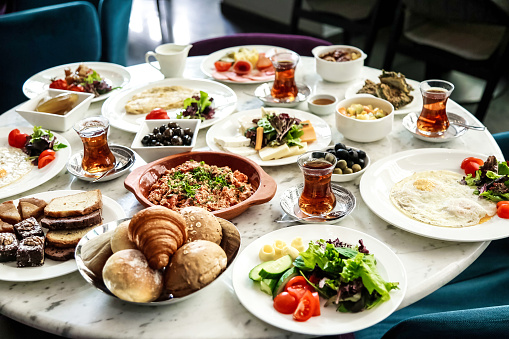 A table filled with a variety of delicious food dishes ready to be enjoyed.