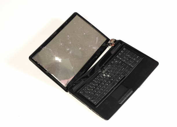 istock Old broken laptop isolated on white background 2149625912
