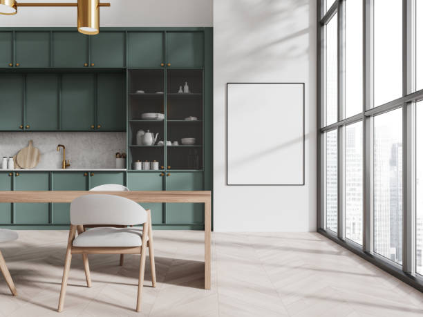istock White and green kitchen interior with table and poster 2149628818