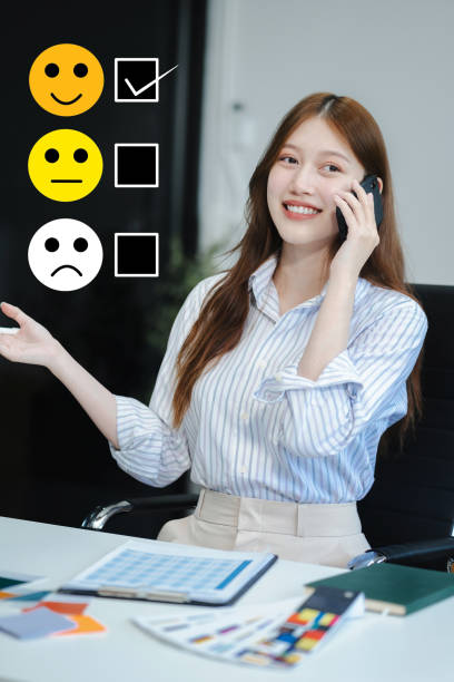 istock Happy Client customer experience concept. Woman recording phone inquiry with checkboxes, smiling face rating excellent for satisfaction survey. 2149628895