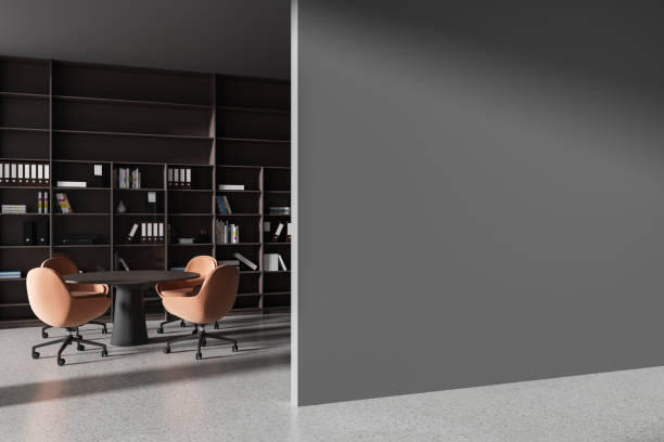 istock Modern office meeting room interior with table and chairs, shelf and mockup wall 2149629436