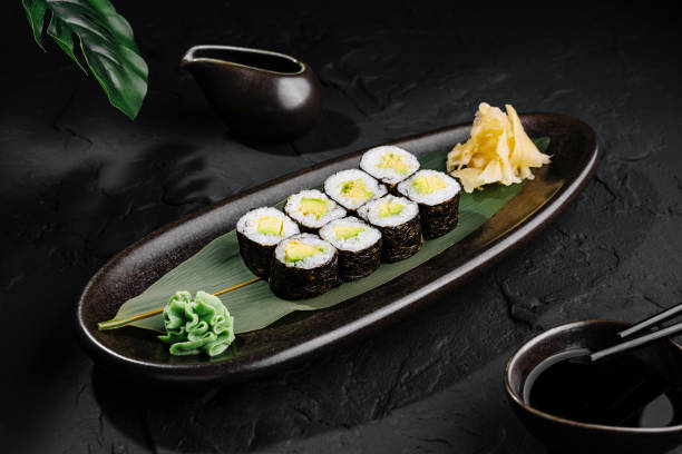 istock Elegant sushi platter on dark stone background 2149629898