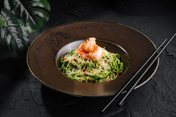 istock Gourmet asian shrimp salad on elegant plate 2149629919