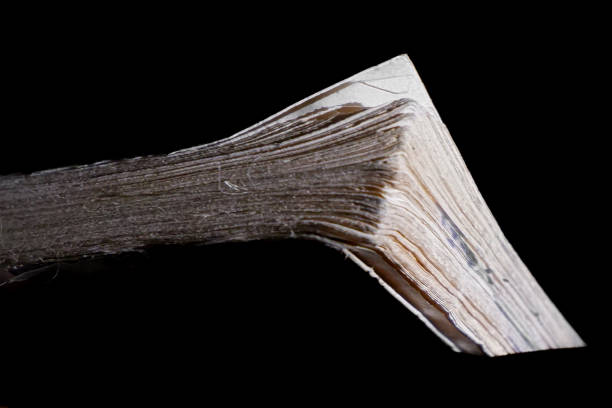 close up of a thick old book on a dark background