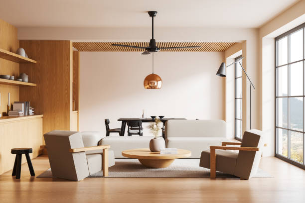 istock Modern home living room interior with eating table and couch, panoramic window 2149630237