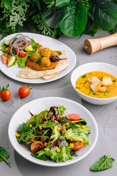 istock Fresh vegetarian salad and soup meal setup 2149630853