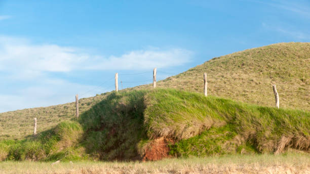 istock Picket fence on meadow on mound 2149632269