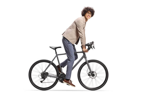 istock Man riding a bicycle and looking at camera 2149632334