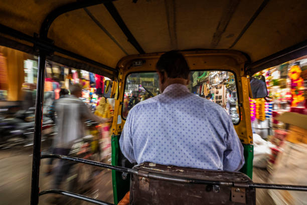 istock Indian man drives auto rickshaw (tuk-tuk), India 2149633904