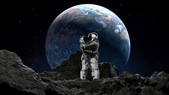 Two astronauts hugging on a rocky terrain against a backdrop of Earth rising in the space sky. 3d render