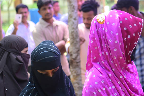 AGARTALA,TRIPURA,19-04-2024: Muslim people wait in a queue to cast their votes for the first phase of Lok Sabha elections at a polling station of Sonamura some 58 km away from Agartala. PHOTO BY-ABHISEK SAHA