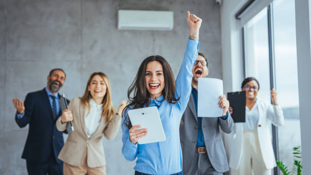 istock Shot of office staff celebrating a win. 2149638942