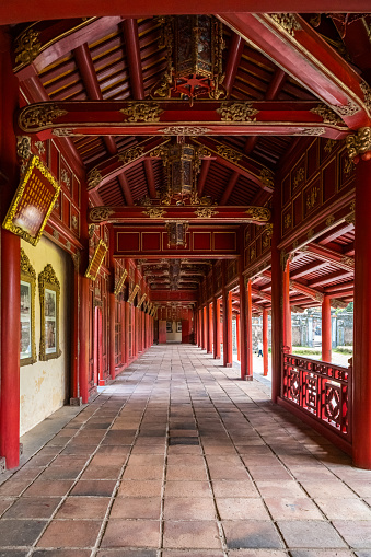 red colored wooden structure of corridor in the Hue citadel, vietnam