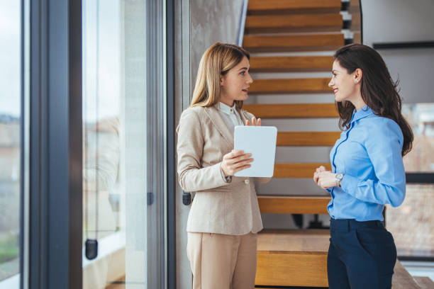istock Two business women having a discussion 2149639831