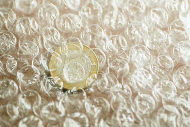 1 euro coin wrapped in bubble pack