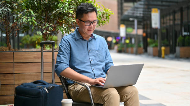 istock Tech on the Go: A Businessman's Al Fresco Office 2149640651