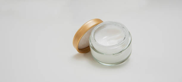 istock Skincare jar with cosmetic anti aging cream on white background 2149643100