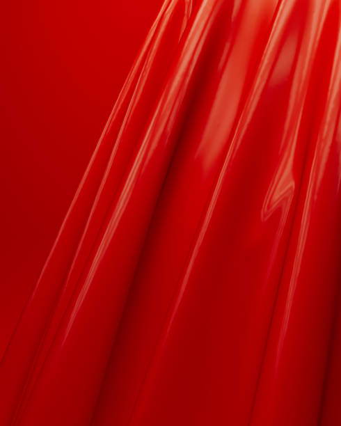 istock Red folds ripples rubber latex silky smooth vibrant abstract background 2149644270