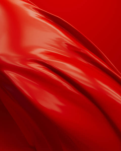 istock Red folds ripples rubber latex silky smooth vibrant abstract background 2149644279