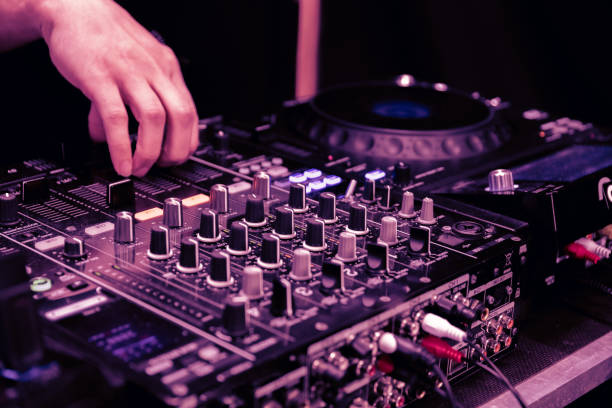 istock close up of DJ hands on dj console mixer 2149644423