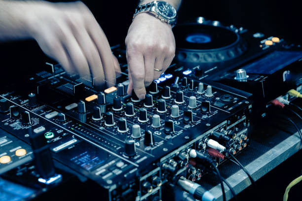 istock close up of DJ hands on dj console mixer 2149644429