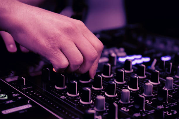 istock close up of DJ hands on dj console mixer 2149644455