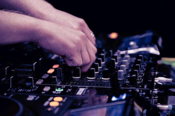 istock close up of DJ hands on dj console mixer 2149644465
