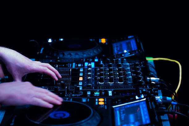 istock close up of DJ hands on dj console mixer 2149644585