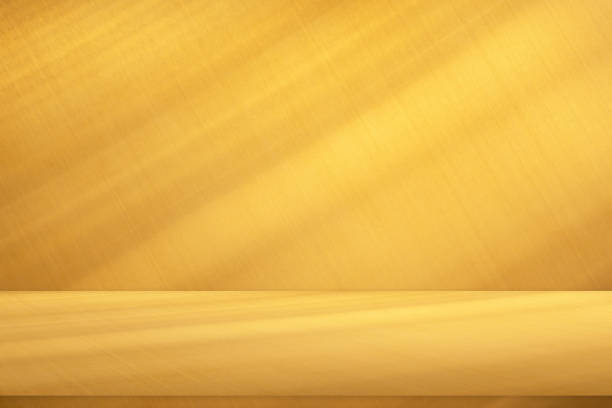istock Wall interior background, studio and backdrops show products.with shadow from window color Gold. background for text insertion and presentation product 2149645466