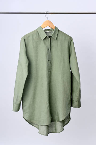 istock Linen shirt hanging on wooden hanger 2149648232