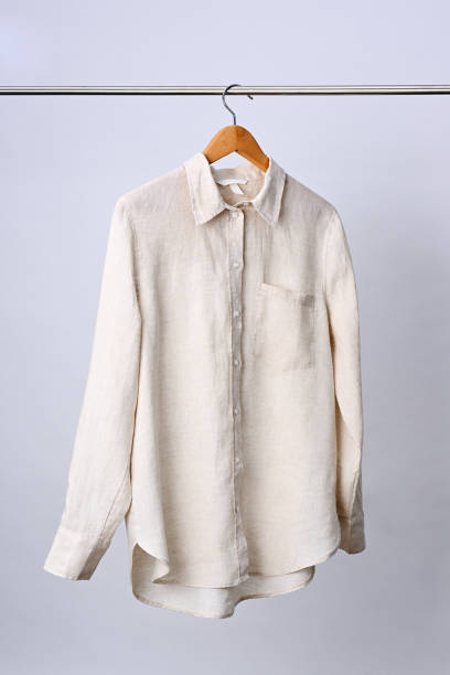istock Linen shirt hanging on wooden hanger 2149648258