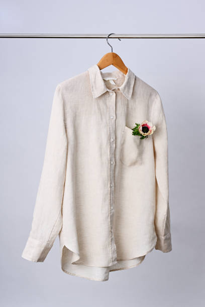 istock Linen shirt hanging on wooden hanger 2149648260