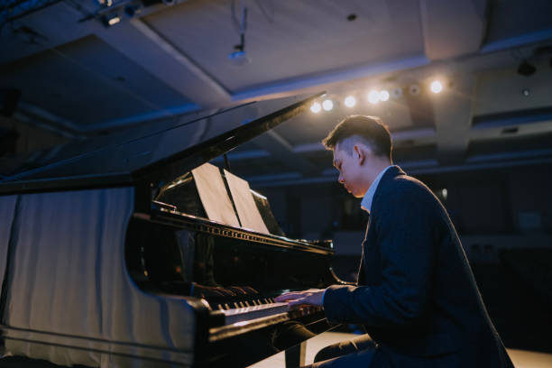 istock Asian talented Chinese pianist performing on stage 2149648773
