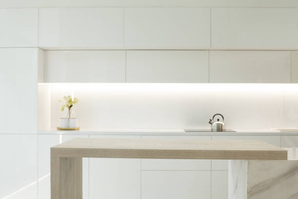 istock Blank empty wooden table board on white color modern kitchen interior background 2149648871