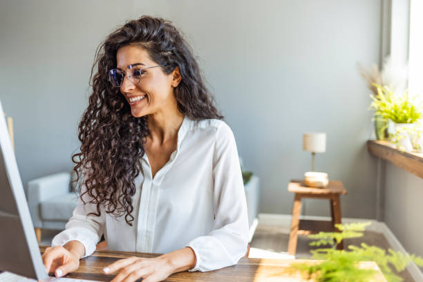 istock Shot of a young businesswoman working on a computer in an office 2149649621