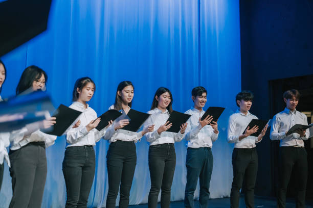 istock Asian Chinese Choir chorus performance group Singing on stage 2149650315
