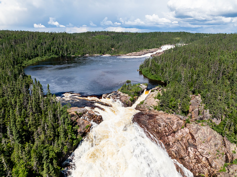 Aerial View of Chute Du Manitou, Cote Nord, Quebec, Canada During Summer.
Located 35 km (22 mi.) from Rivière-au-Tonnerre. Manitou Waterfall is a spectacular 35 m (115-ft.) high.