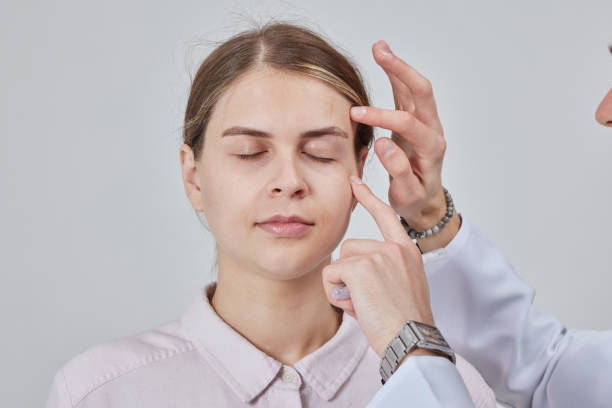 istock plastic surgeon prepares for Blepharoplasty, Blepharoplasty operation 2149654338